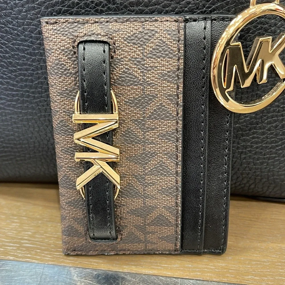 MICHAEL KORS
Reed Large Card Holder Case Wallet 
Brown /Black MK Signature 
NWT - Picture 2 of 16